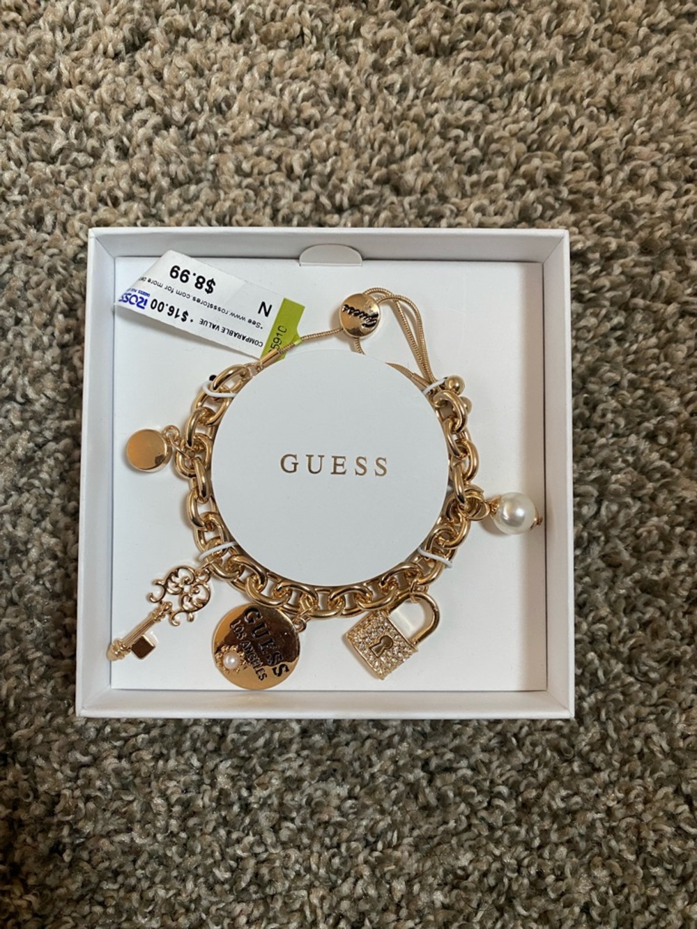 GUESS Gold-tone Charm Bracelet with Pearl and Lock Charms